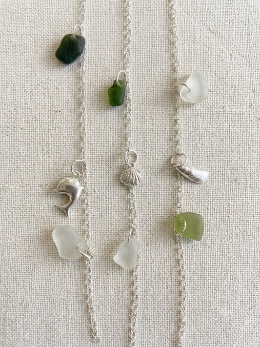Recycled 925 sterling silver bracelet with sea glass and charm accent