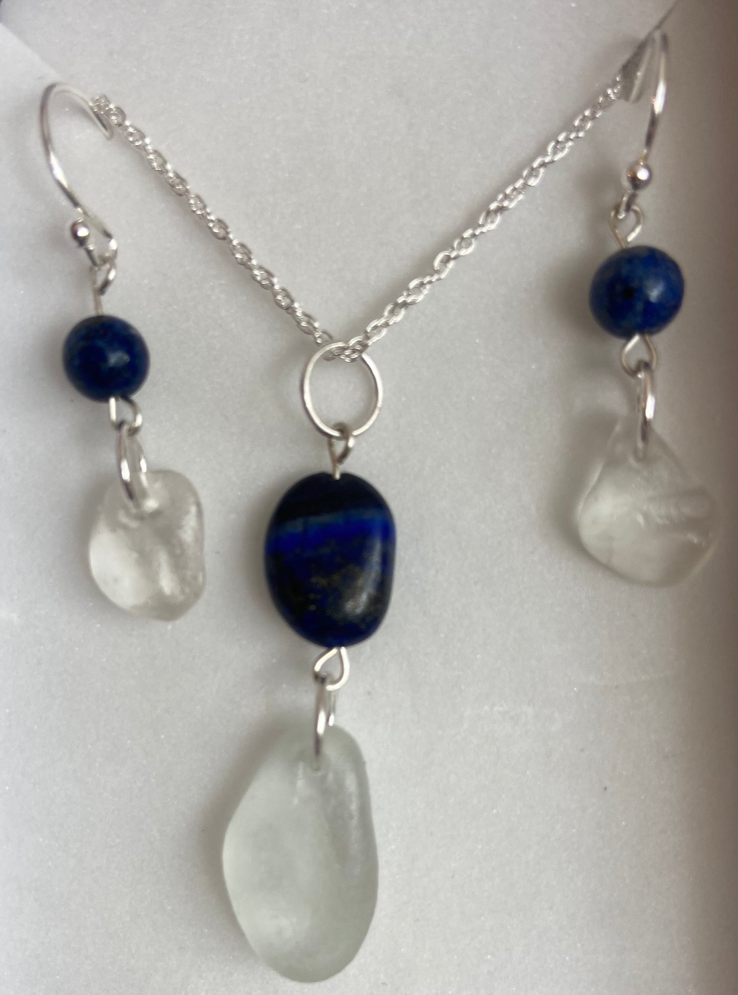 Matching necklace and earrings set featuring clear sea glass and 925 recycled sterling silver fine rope chain